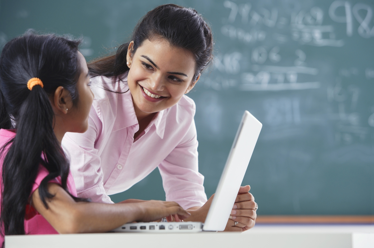 Student with teacher on laptop